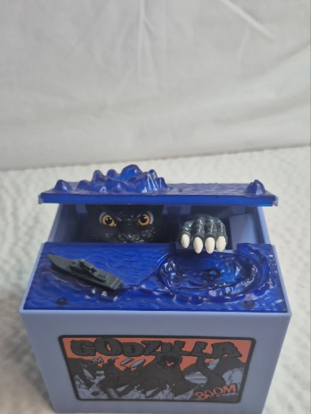 Godzilla Boom Collectible Still Bank Blue Plastic Piggy Bank with Ship Comic Art